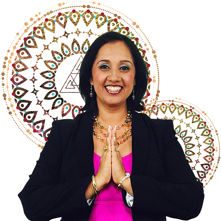 A woman with her hands folded in front of a circular pattern, representing the soul's journey to discover its unique SoulCode.